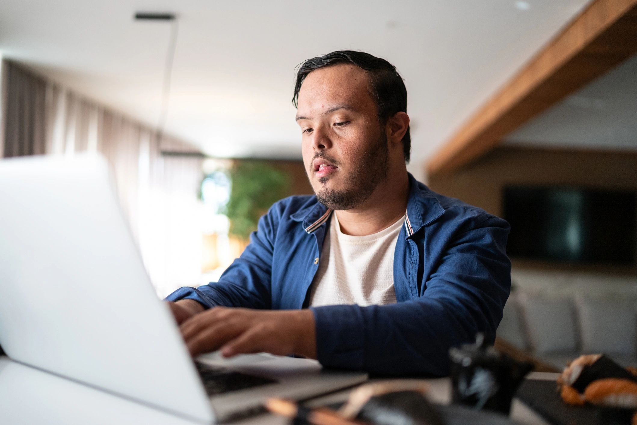 Student on a laptop during an online consultation