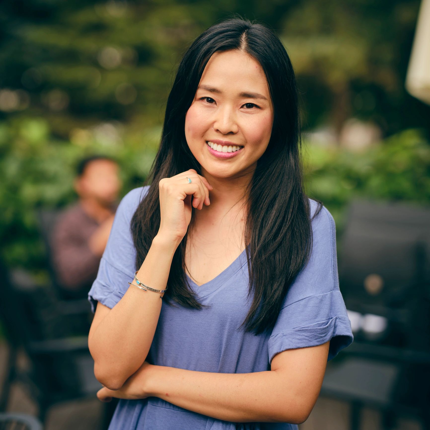 Portrait headshot of a young adult woman