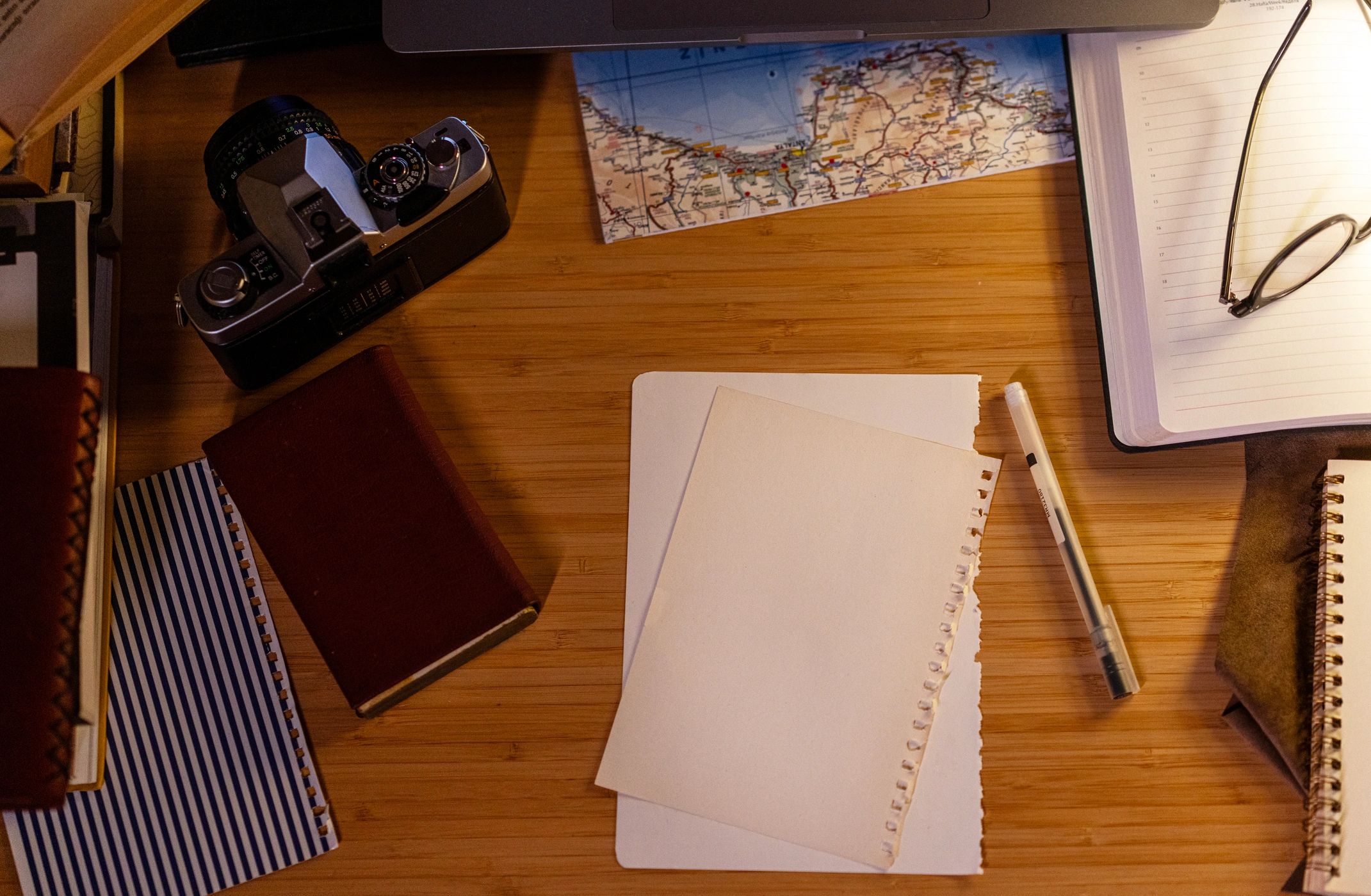 Travel documents and workspace representing application paperwork